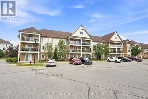 204 - 124 Aspen Springs Drive, Clarington (Bowmanville), ON - Outdoor With Balcony With Facade