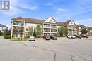 204 - 124 Aspen Springs Drive, Clarington (Bowmanville), ON  - Outdoor With Balcony With Facade 
