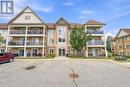204 - 124 Aspen Springs Drive, Clarington (Bowmanville), ON  - Outdoor With Balcony With Facade 