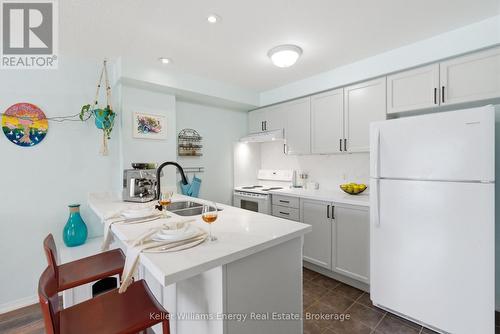 Quartz Counters - 204 - 124 Aspen Springs Drive, Clarington (Bowmanville), ON - Indoor Photo Showing Kitchen With Double Sink