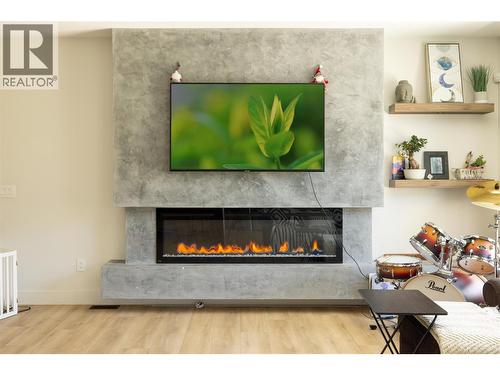 10272 Long Road, Lake Country, BC - Indoor Photo Showing Other Room With Fireplace