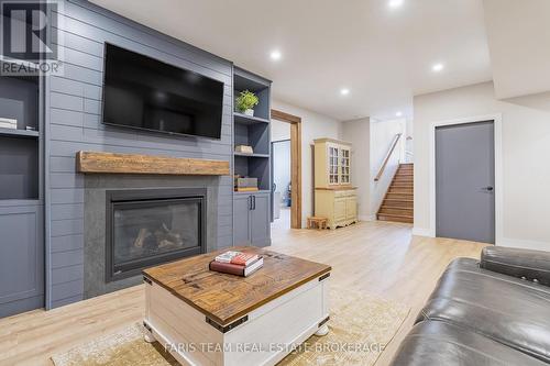 116 Mamie Avenue, Wasaga Beach, ON - Indoor Photo Showing Living Room With Fireplace