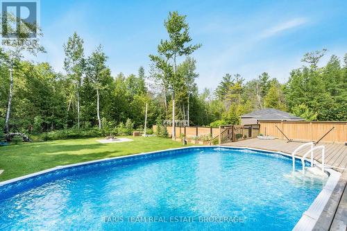 116 Mamie Avenue, Wasaga Beach, ON - Outdoor With Above Ground Pool With Backyard