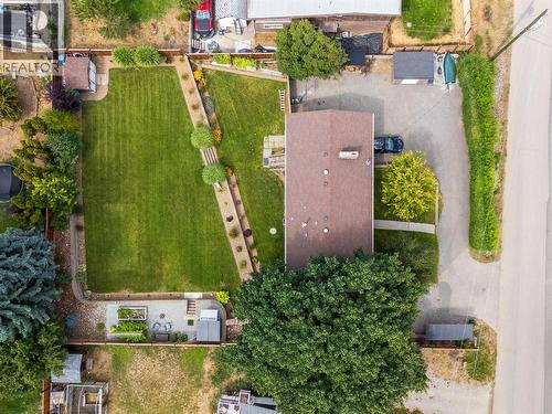 Large, beautifully maintained yard; Oversized driveway and RV parking - 5054 Chute Lake Crescent, Kelowna, BC - Outdoor