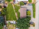 Large, beautifully maintained yard; Oversized driveway and RV parking - 5054 Chute Lake Crescent, Kelowna, BC  - Outdoor 