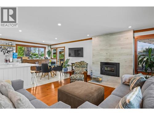 5054 Chute Lake Crescent, Kelowna, BC - Indoor Photo Showing Living Room With Fireplace