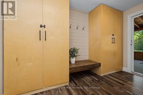 Built-in storage linking sunroom w living room - 15 Victoria Street W, Seguin, ON - Indoor Photo Showing Other Room