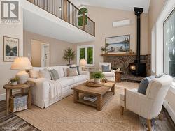 Living room w stone fireplace, staged - 