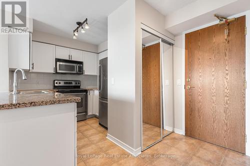 1707 - 4889 Kimbermount Avenue, Mississauga, ON - Indoor Photo Showing Kitchen With Double Sink