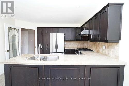 4887 Natkarni Crescent, Mississauga, ON - Indoor Photo Showing Kitchen With Double Sink