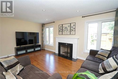 4887 Natkarni Crescent, Mississauga, ON - Indoor Photo Showing Living Room With Fireplace