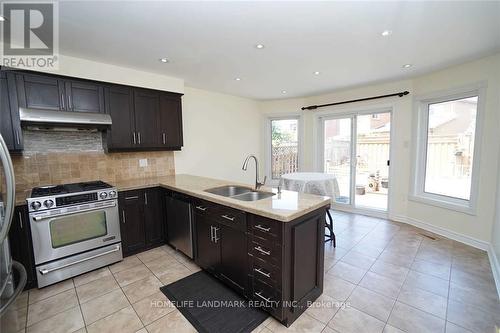 4887 Natkarni Crescent, Mississauga, ON - Indoor Photo Showing Kitchen With Double Sink
