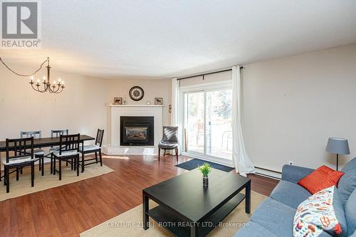 90 - 127 Alfred Street W, Blue Mountains, ON - Indoor Photo Showing Living Room With Fireplace