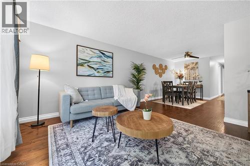 Living Room Combined With Dining - 6 Bardadyn Court, St. Catharines, ON - Indoor Photo Showing Living Room With Fireplace
