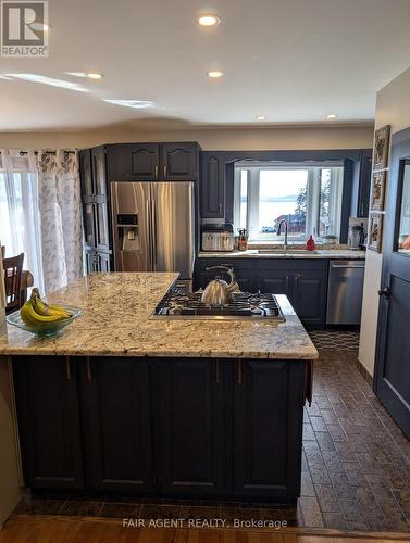 743022 & 743024 Dawson Point Road, Timiskaming (Tim - Outside - Rural), ON - Indoor Photo Showing Kitchen With Upgraded Kitchen