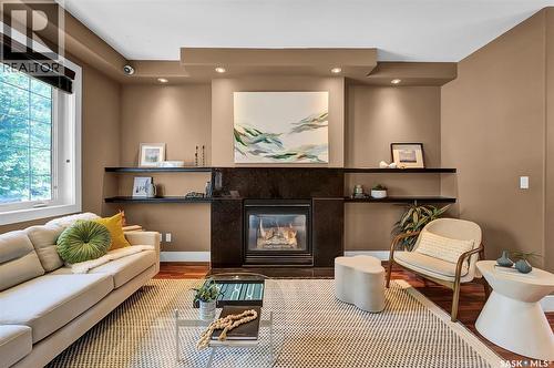 2218 St Andrews Avenue, Saskatoon, SK - Indoor Photo Showing Living Room With Fireplace