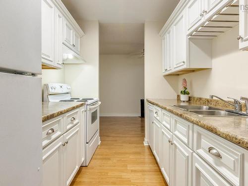 #417 15 Langbrae Drive, Clayton Park, NS - Indoor Photo Showing Kitchen With Double Sink