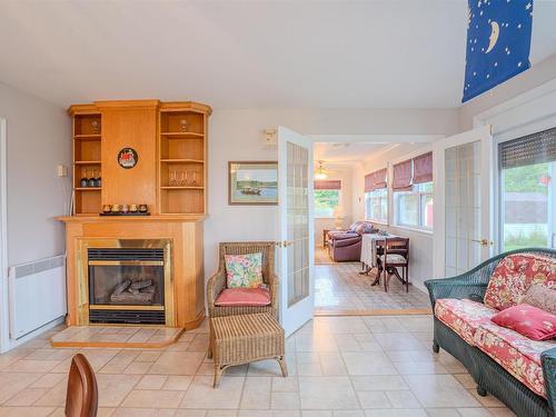 78 Lady Slipper Lane, Murray River, PE - Indoor Photo Showing Living Room With Fireplace