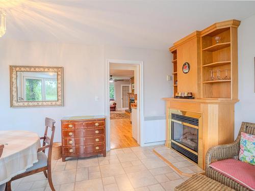 78 Lady Slipper Lane, Murray River, PE - Indoor Photo Showing Living Room With Fireplace