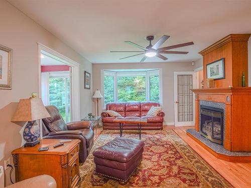 78 Lady Slipper Lane, Murray River, PE - Indoor Photo Showing Living Room With Fireplace