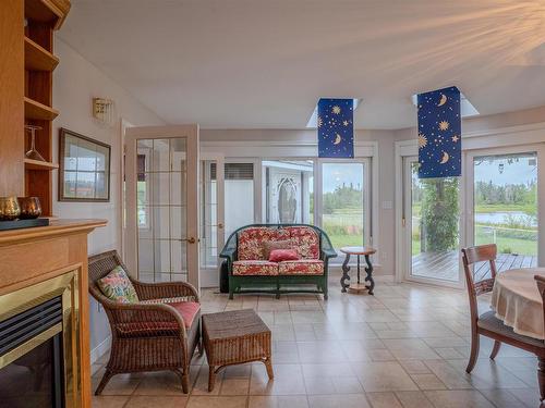 78 Lady Slipper Lane, Murray River, PE - Indoor Photo Showing Living Room With Fireplace