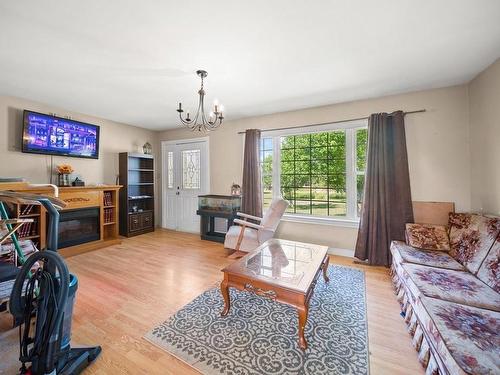 370 Diversion Road, Ellerslie-Bideford, PE - Indoor Photo Showing Living Room With Fireplace
