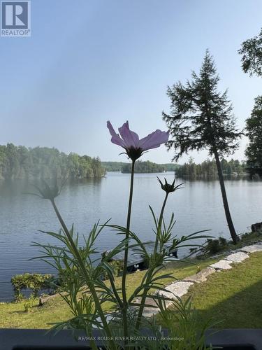 1087 Lagoon Road, Highlands East (Cardiff Ward), ON - Outdoor With Body Of Water With View