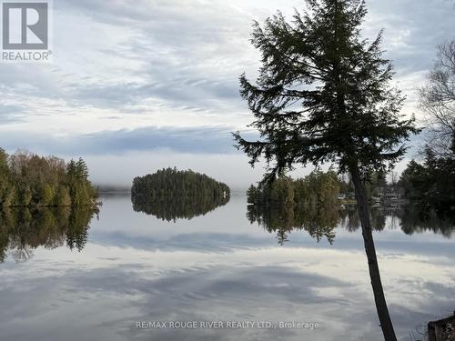 1087 Lagoon Road, Highlands East (Cardiff Ward), ON - Outdoor With Body Of Water With View
