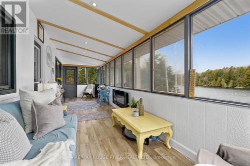 1087 Lagoon Road, Highlands East (Cardiff Ward), ON - Indoor With Fireplace