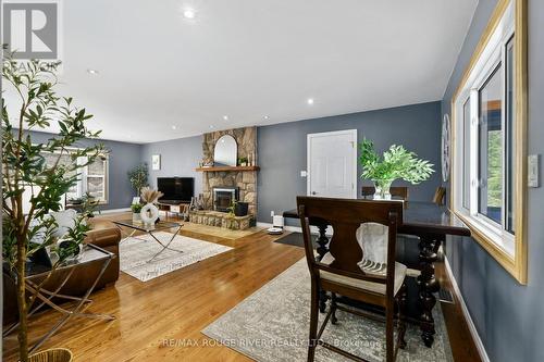 1087 Lagoon Road, Highlands East (Cardiff Ward), ON - Indoor Photo Showing Other Room With Fireplace