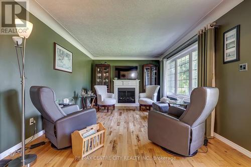 4766 Sunset Road, Central Elgin (Port Stanley), ON - Indoor Photo Showing Living Room With Fireplace