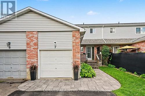 Single attached garage and stone walkway - 7 Isabella Street, Perth, ON - Outdoor