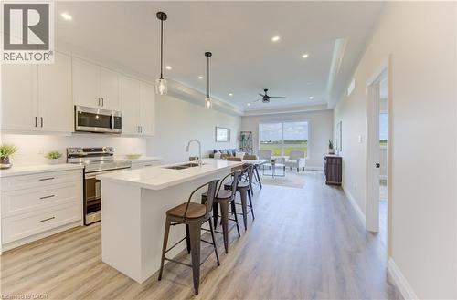 98 Bedell Drive, Drayton, ON - Indoor Photo Showing Kitchen With Double Sink With Upgraded Kitchen