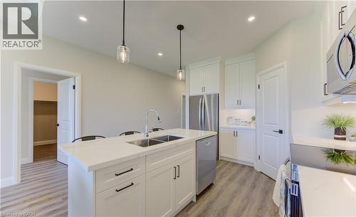 98 Bedell Drive, Drayton, ON - Indoor Photo Showing Kitchen With Double Sink With Upgraded Kitchen