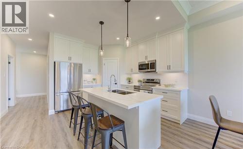98 Bedell Drive, Drayton, ON - Indoor Photo Showing Kitchen With Double Sink With Upgraded Kitchen