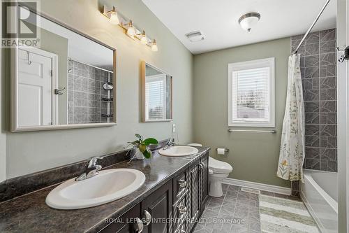 double sink vanity - 53 Beaver Lane, The Nation, ON - Indoor Photo Showing Bathroom
