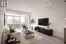 303 - 1285 Queen Street E, Toronto, ON  - Indoor Photo Showing Living Room 