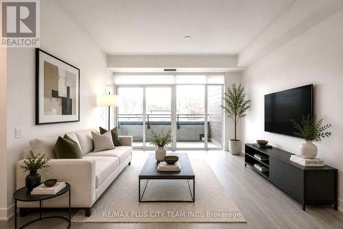 303 - 1285 Queen Street E, Toronto, ON - Indoor Photo Showing Living Room
