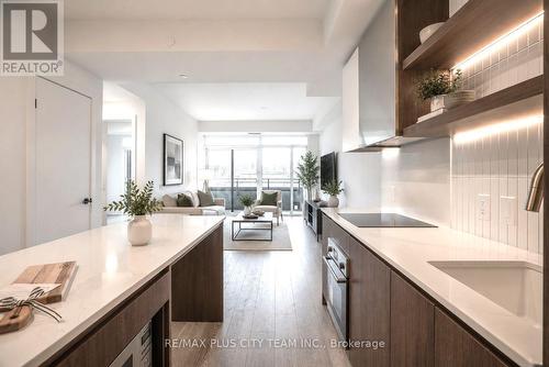 303 - 1285 Queen Street E, Toronto, ON - Indoor Photo Showing Kitchen With Upgraded Kitchen