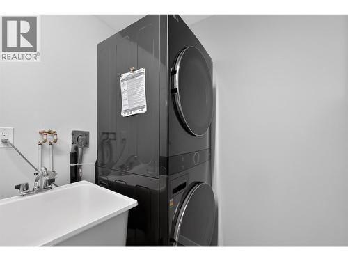 Laundry room sink! - 1610 Gordon Drive Unit# 101 Lot# 1, Kelowna, BC - Indoor Photo Showing Laundry Room