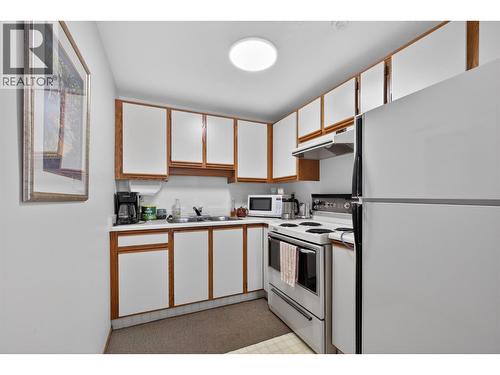Amenities Room Kitchen - 1610 Gordon Drive Unit# 101 Lot# 1, Kelowna, BC - Indoor Photo Showing Kitchen With Double Sink