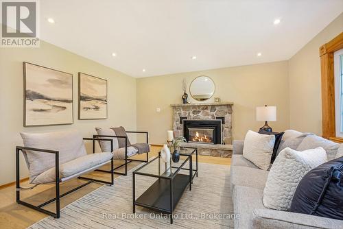 8759 Wellington 124 Road, Erin, ON - Indoor Photo Showing Living Room With Fireplace