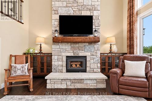 88 Conservation Trail, Centre Wellington (Belwood), ON - Indoor Photo Showing Living Room With Fireplace