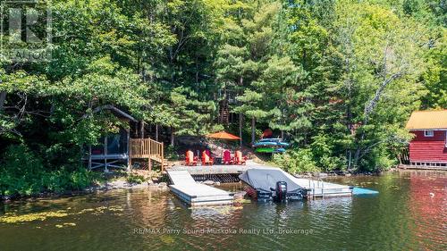 Extensive decking & docking - 13 Peak Path, Seguin, ON - Outdoor With Body Of Water