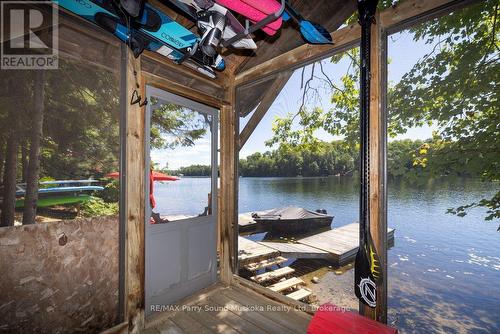 Lakeside gabzebo / storage - 13 Peak Path, Seguin, ON - Outdoor With Body Of Water