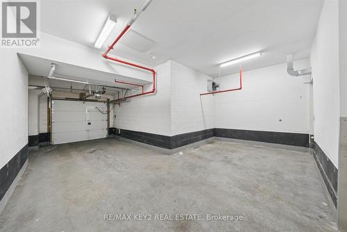 Th6 - 4011 Brickstone Mews, Mississauga, ON - Indoor Photo Showing Garage