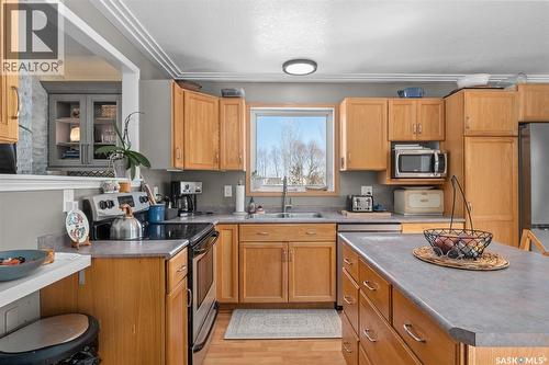 808 Lakeridge Drive, Buckland Rm No. 491, SK - Indoor Photo Showing Kitchen With Double Sink