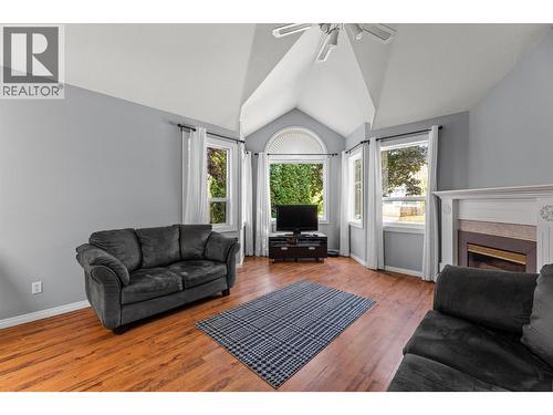 1881 Portland Place, Kelowna, BC - Indoor Photo Showing Living Room With Fireplace