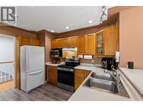1881 Portland Place, Kelowna, BC - Indoor Photo Showing Kitchen With Double Sink