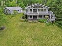 Viceroy Style Home on Skootamatta River - 32 Skootamatta Lane, Tweed (Tweed (Village)), ON  - Outdoor With Deck Patio Veranda 